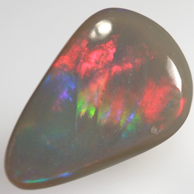 SOLID BLACK OPAL Broad rolling flash of cherry red fire
